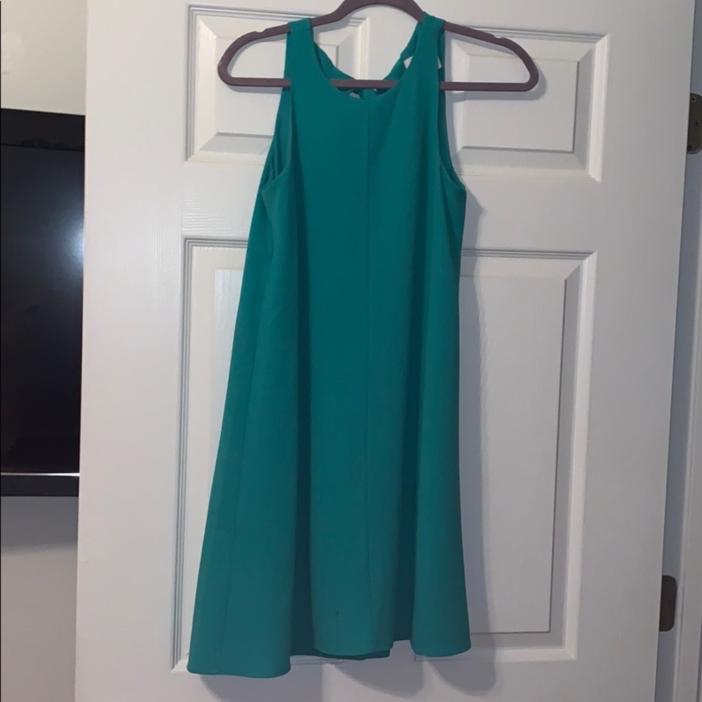 A beautiful sleeveless dress by Chandler Henry